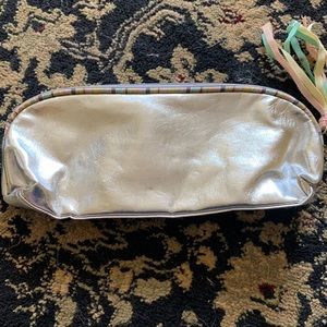 Lightly used cosmetic brush bag.